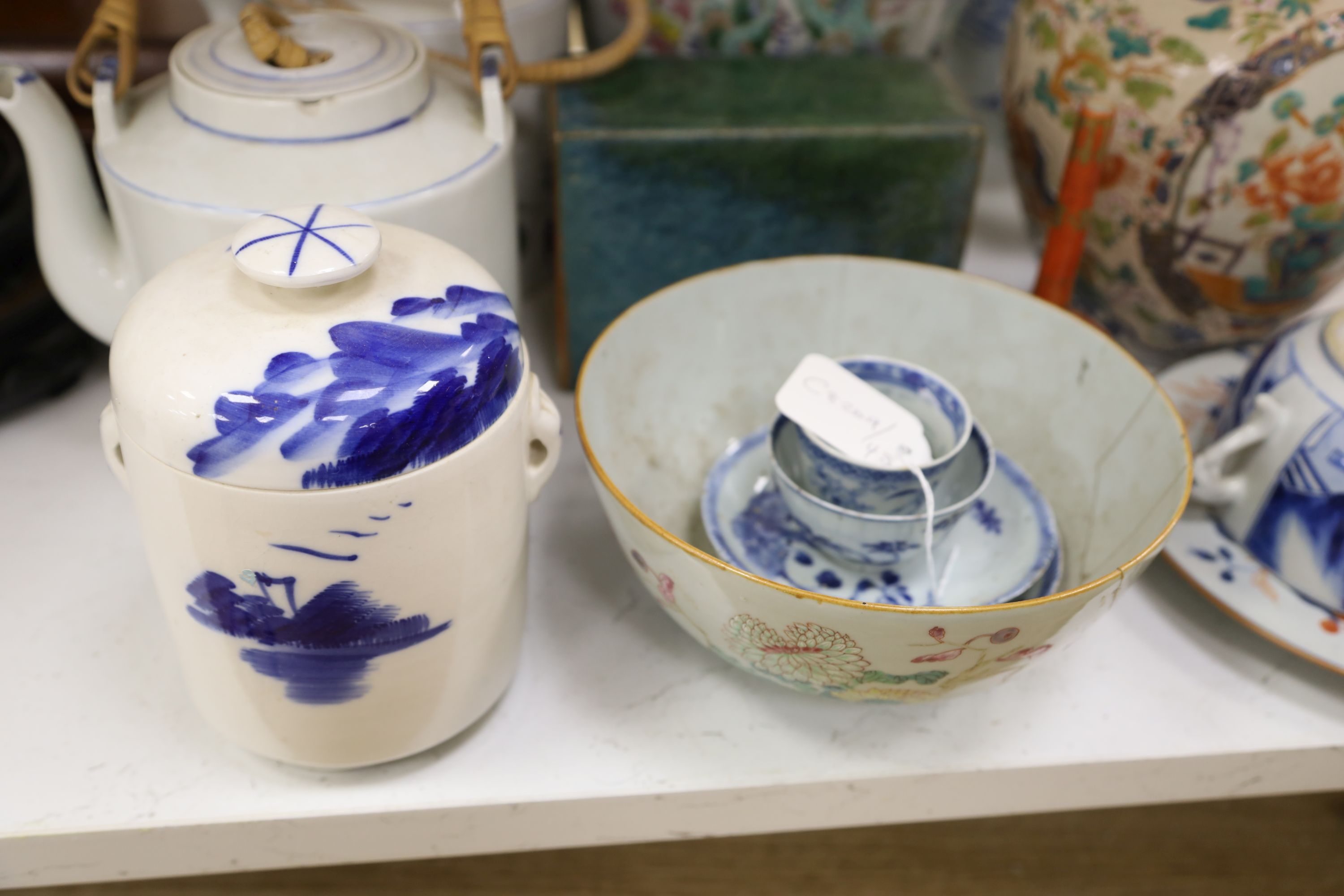 A Chinese famille rose vase, two teapots, mixed Chinese and Japanese ceramics and a lamp